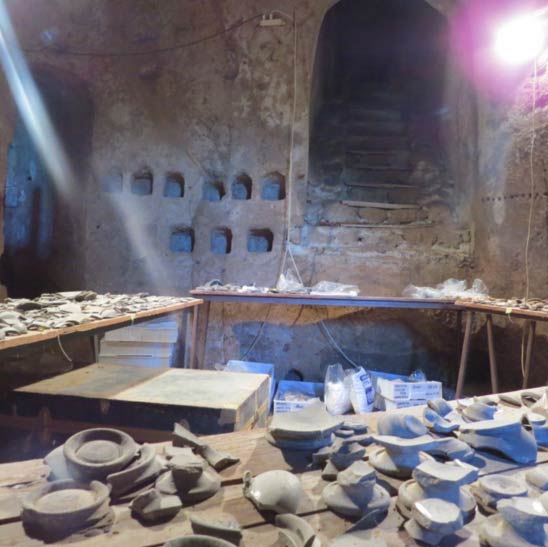 A medieval chamber for raising pigeons, called a columbarium, filled with excavated pottery