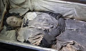 What is a fetus doing inside the coffin of a 17th century mummified bishop? Mummified-remains-bishop