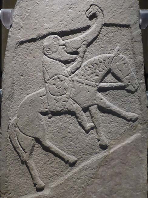 Bearded Pictish warrior from the Bullion Stone, Angus, now in the National Museum of Scotland.