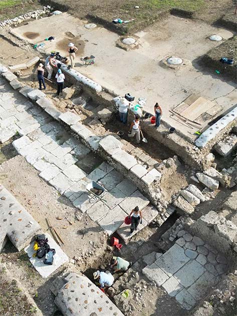 Drone view of the excavation of two footpaths lining the street separating the basilica (top) from the theatre (bottom) at Interamna Lirenas. (Alessandro Launaro)