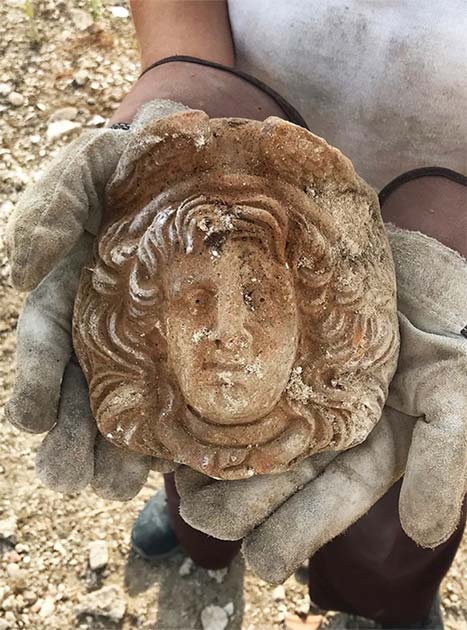 Gorgon antefix (likely 3rd to 2nd century BC), found in a dump of material within the theatre following its abandonment. The antefix probably belonged to an earlier nearby building. (Alessandro Launaro)