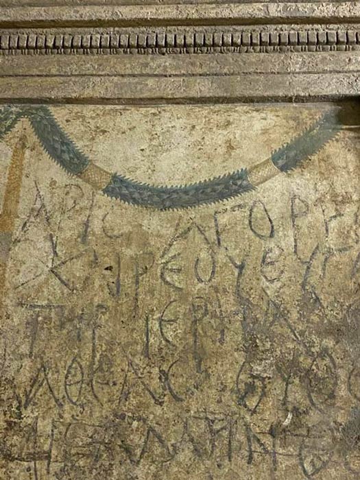 Greek names on the tomb walls within the Naples necropolis scribbled in ancient Greek offer clues to the deceased's identities. The site will open to the public for the first time ever in mid-2022. (Ipogeo dei Cristallini)