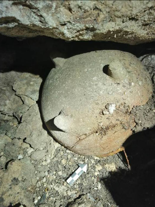 The conical support Maya tripod bowl, used in pre-Hispanic Maya rituals, found in the cave was more finely made and was placed face down near a water body. (INAH)