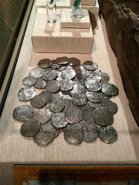 Some genuine silver reales (pieces of eight) from Mel Fisher’s salvage expeditions. (Yesterdays-Paper)