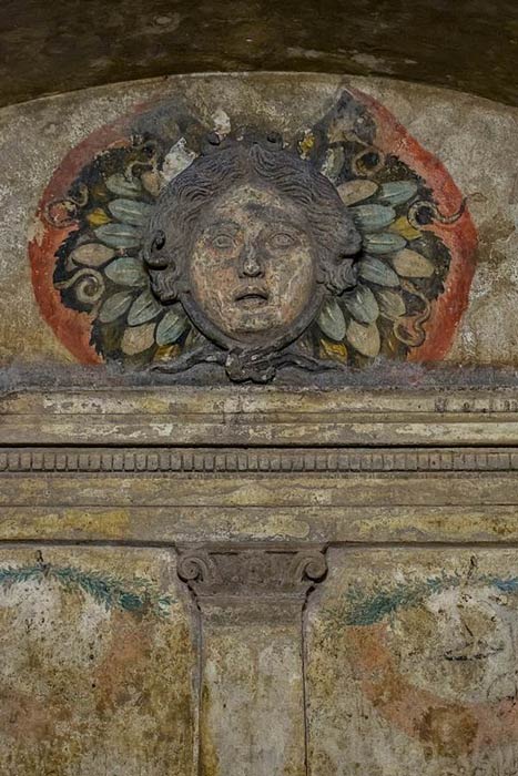 A gorgon, which first appear in ancient Greek literature, carved in volcanic rock tuff and painted in tomb C of the Ipogeo dei Cristallini in Naples, Italy. (Alessandra Calise Martuscelli / CC BY-SA 4.0)