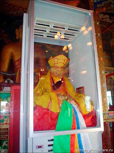 Normally lama Itigilov sits inside the special glass sarcophagus located on the second floor of his 'palace'.