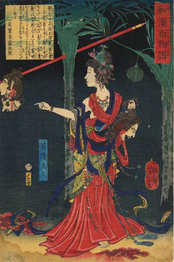 A Kitsune, Lady Kayo, holding a severed head.