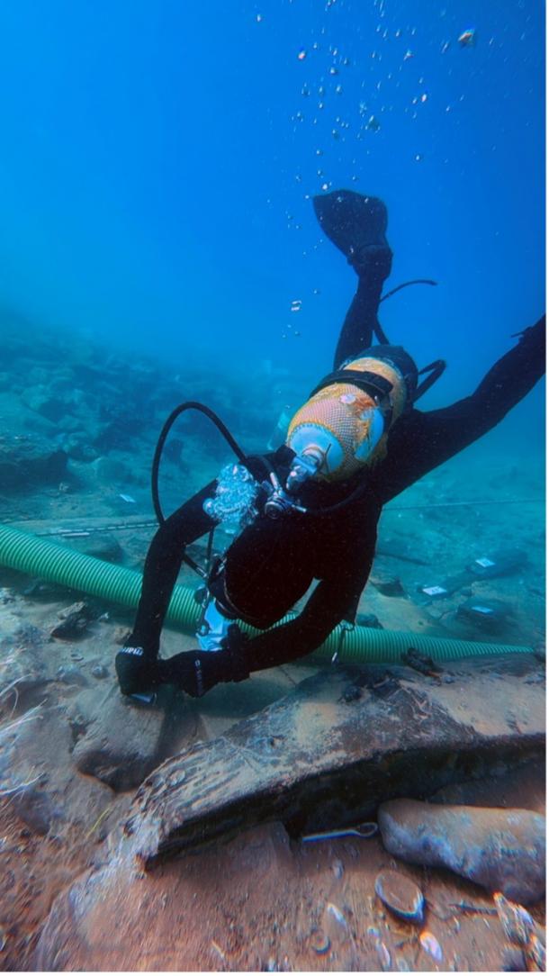 A marine archaeologist working at the Gela II site.