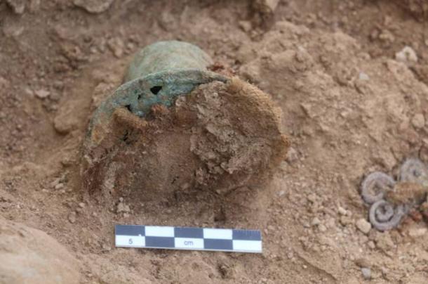 A metal and textile object found at the site. (Peru's Ministry of Culture)