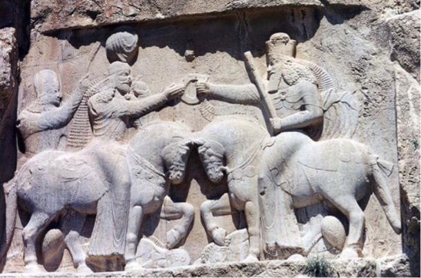 Ahura Mazda (on the right, with high crown) presents Ardashir I (left). 