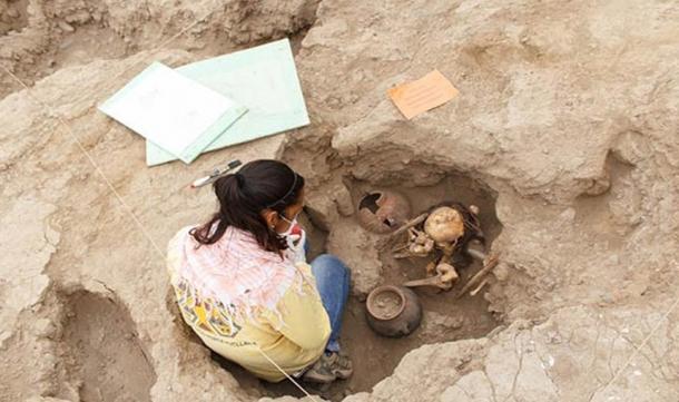 Archaeologist Mirella Ganoza examining one of the burials in Lima, Peru.