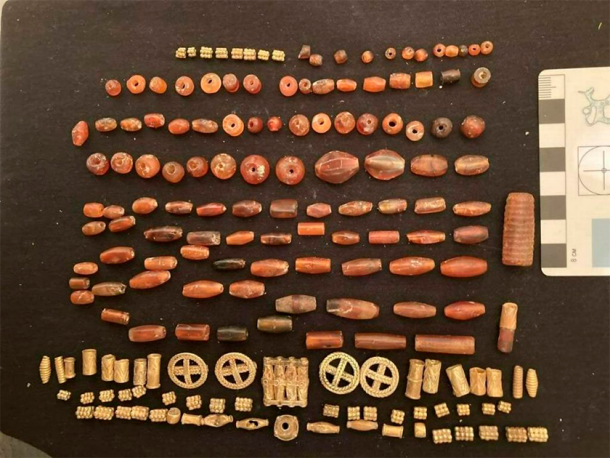 Beads and gold pendants from a recently discovered tomb at the Metsamor necropolis in Armenia. Photo Credit: Science in Poland.