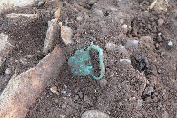 Bronze belt buckle discovered at the site of the ancient Celtic village in Germany. (Bavarian State Office for Monument Preservation)