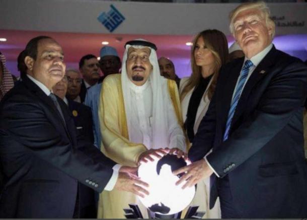 Donald Trump, President of Egypt and King of Saudi Arabia touching a glowing golden orb. (Mike Licht, NotionsCapital/CC BY 2.0).