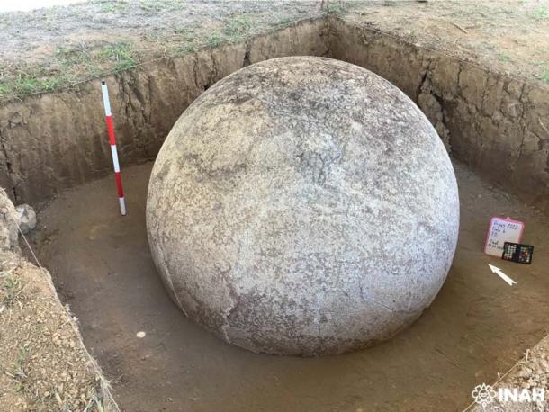 Excavated stone being recorded, images taken and some restoration work performed. (INAH)