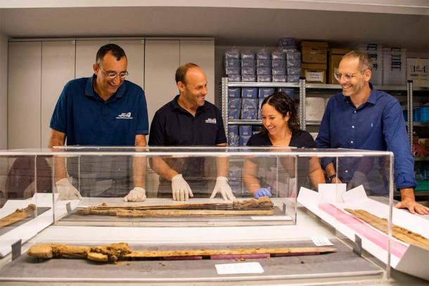 From right to left: Dr. Asaf Gayer, Oriya Amichay, Dr. Eitan Klein and Amir Ganor.  (Yoli Schwartz/Israel Antiquities Authority)