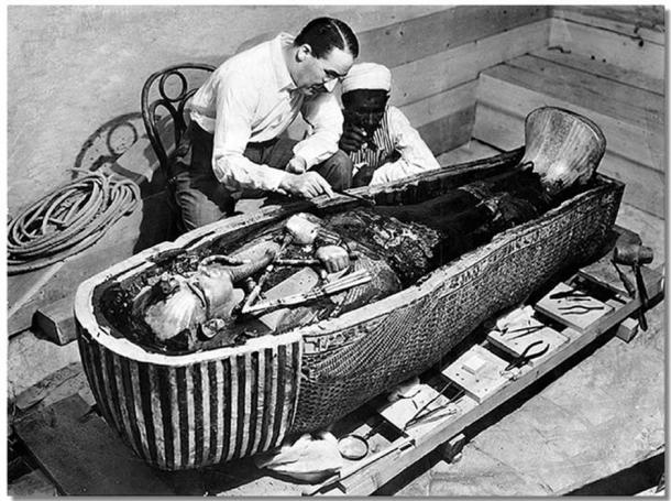 Howard Carter opens the innermost shrine of King Tutankhamun's tomb near Luxor, Egypt. 