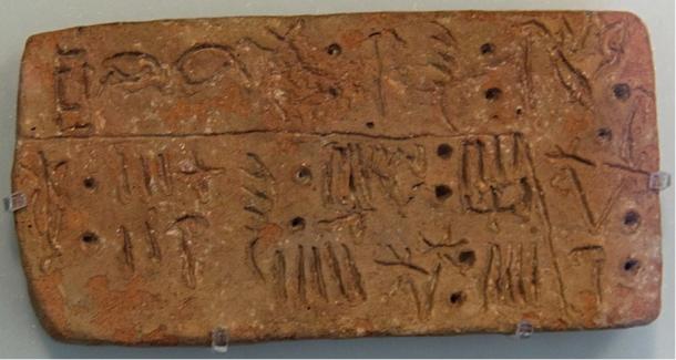 Linear A inscription on a clay tablet from Crete, probably 15th century BC. Archaeological Museum of Heraklion.