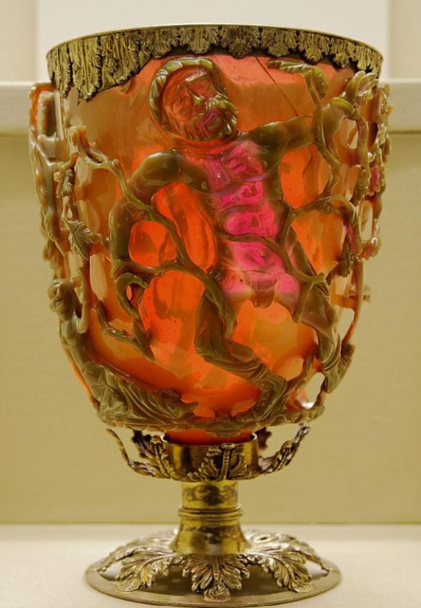 A side of a Late Roman cage cup in dichroic (changing color) glass. 