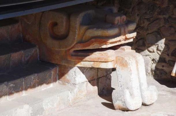 Megalithic stone head from the earlier layer of construction. 