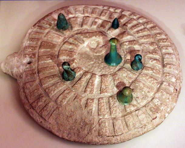 Mehen game with gamestones, from Abydos, Egypt.