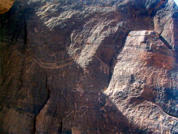 Predynastic rock image, with ruler boat being pulled by 25 people, ca. 3200 BC, Wadi al Agebab. (© Mohamed Abdel Hay Abu Baker)