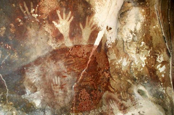 Prehistoric cave painting showing hands at Petta-kere, South Sulawesi.