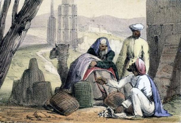 Print waarop cowrie schelpengeld wordt gebruikt door een Arabische handelaar. (Andy king50 / Publiek Domein)