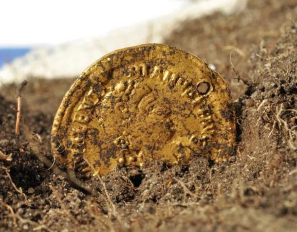 A Roman coin found at the site of Sandby Borg, whose inhabitants probably included a number of unemployed Roman soldiers.