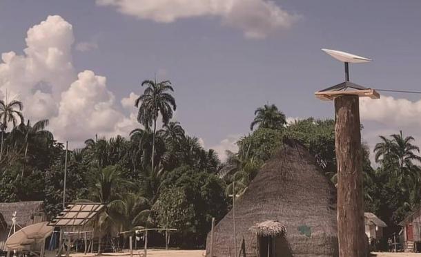 A Starlink antenna set up in a Marubo village deep in the Amazon rainforest.