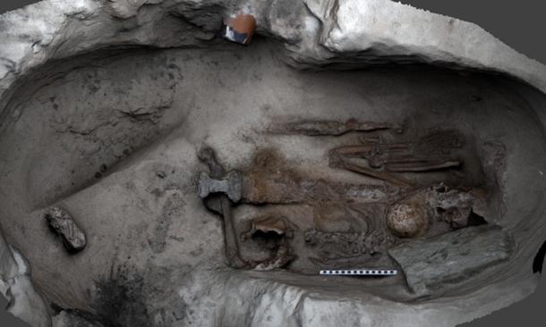 Still from 3D model of the Mayback burial shows the placement of the Viking swords and shield boss overlying the skeleton. (AOC Archaeology)