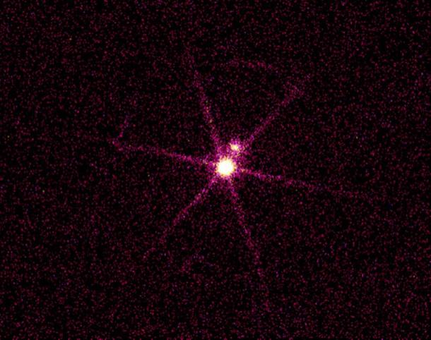 The Chandra X-ray image of Sirius A & B, a double star system located 8.6 light years from Earth, shows a bright source and a dim source. This is not visible with the naked eye.