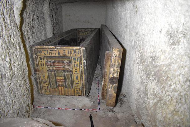 The coffin and its lid are highly decorated.