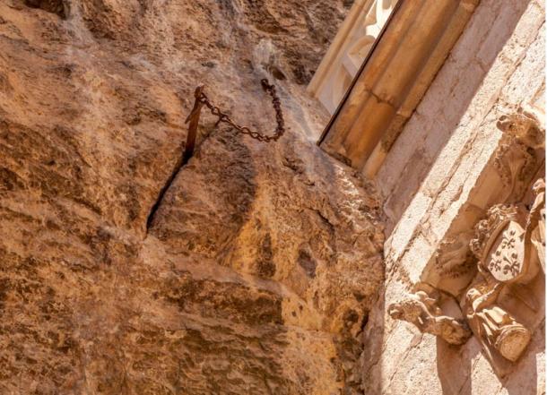 The sword known as Durandal, lodged in the wall at Rocamadour.  (Thomas Launois/Adobe Stock)