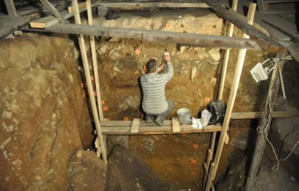 That's Dr. Mike Morley, a researcher at Flinders University, who takes samples from the Denisova Cave complex. (Dr. Paul Goldbert, Wollongong University / EurekAlert!)