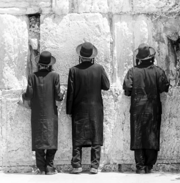   Three Orthodox Jews at prayer. (CC0) 