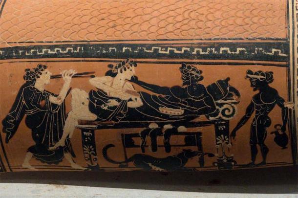 Woman and man on a coach between a flute player and a servant. Ceramic, 6th century BC. Archaeological Museum, Corinth. (Author Provided/The Conversation)