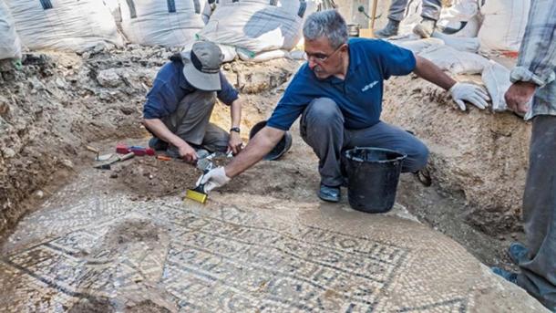 An ancient Greek inscription mentioning the Byzantine emperor Justinian was found at the Jerusalem Old City Damascus Gate, August 2017 (Assaf Peretz, Israel Antiquities Authority)