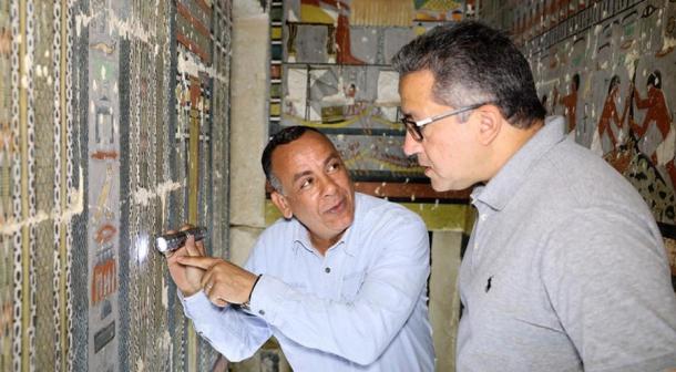 Egyptian archaeologists examining the inside of Khuwy’s tomb, where the earliest example of advanced mummification was discovered and dated to the Old Kingdom period. (Egyptian Ministry of Tourism and Antiquities)