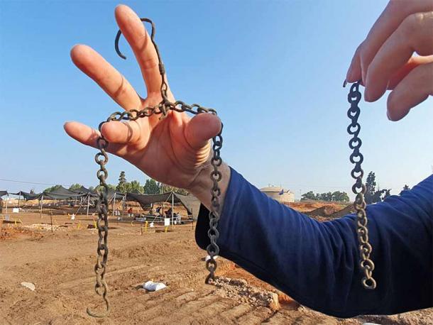 A bronze chain that was used to suspend a chandelier found at the Byzantine-era farmstead under modern Tel Aviv, Israel. (Yoli Schwartz / Israel Antiquities Authority)