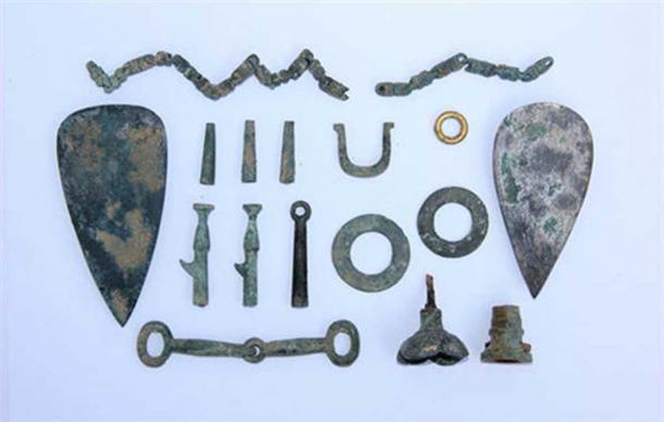 Some of the cultural relics found when Chinese state archaeologists excavated the site, called Yongshan Blood Pool.