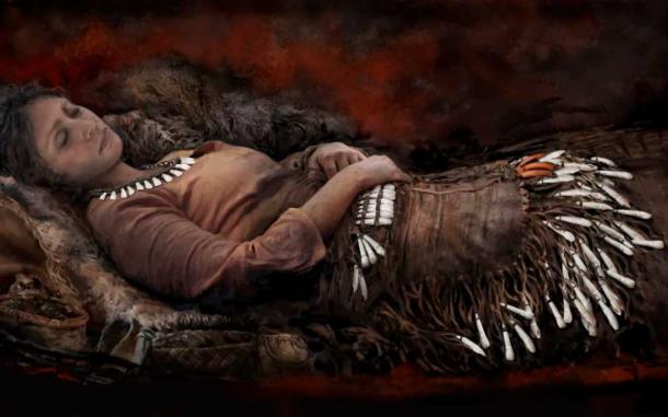 A total of 90 elk teeth were placed next to the hips and thighs of one female skeleton from the same site, possibly attached to a garment resembling an apron. Red ochre had been sprinkled on top of the deceased. This drawing shows what the Yuzhniy Oleniy Ostrov woman may have looked like when she died. (Tom Bjorklund / University of Helsinki)