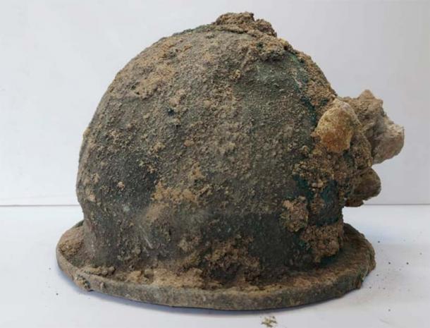 The excavated ancient Greek warrior’s helmet found at the acropolis of Velia in Italy. Credit: Italian Ministry of Culture.