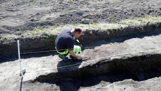 Christian Løchsen Rødsrud excavates for traces of a Viking ship at Jarlsberg Manor outside Tønsberg in southeastern Norway.