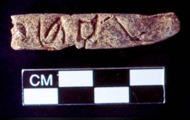 Clay object thought to contain early alphabetic writing.