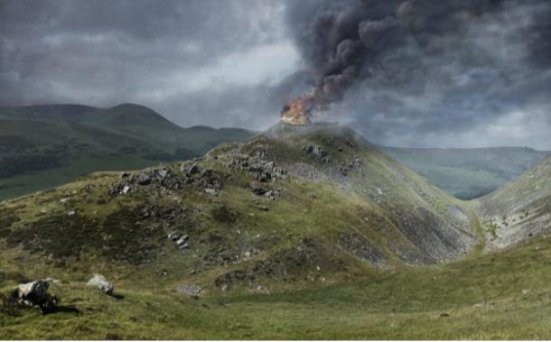 Reconstruction of Tinnis Late Iron Age Fort ablaze