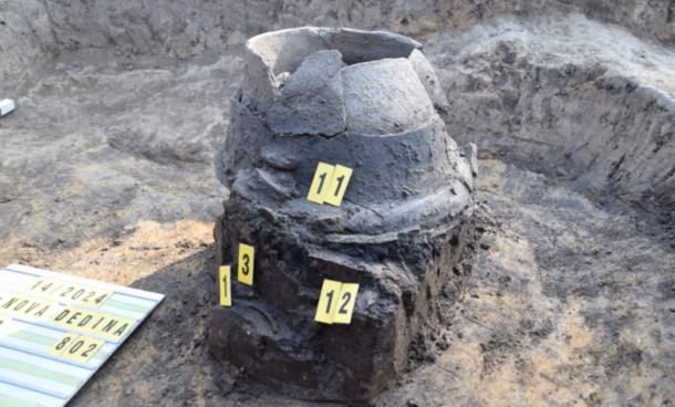 Urn in the grave of the cremated Lusatian discovered in Nové Dědina near Uničov, Czech Republic. 