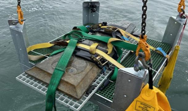 The grave slabs being recovered from the Dorset shipwreck