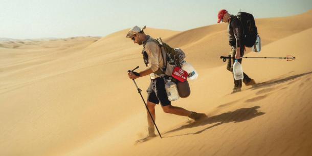 Professor Dominic Stratford and Dr George Leader, trekking the Namib desert.