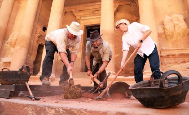 Josh Gates and Pearce Paul Creasman with archaeologist Matthew Vincent, in front of the Treasury at Petra